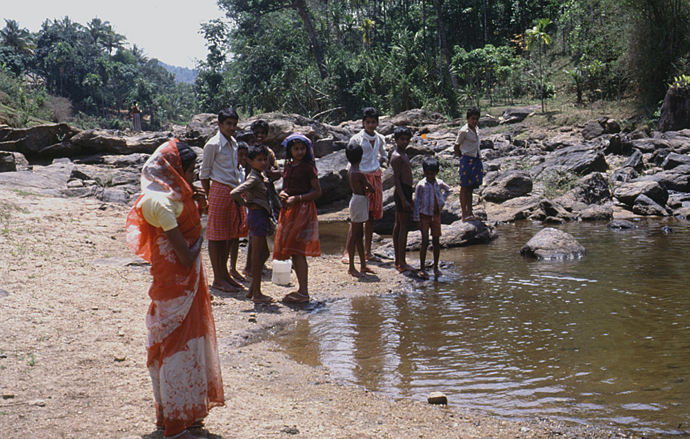 Attracting interested children at the Deviyar River.